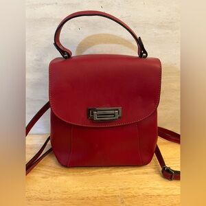 Cielo Celeste Leather Handcrafted In Italy Convertible Backpack
Purse